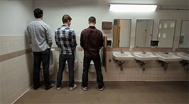 Students stand back public toilet