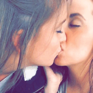 Sexy lesbians tongue fuck each other