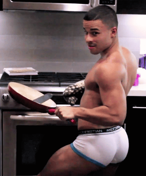 Wearing apron topless baking cookies kitchen