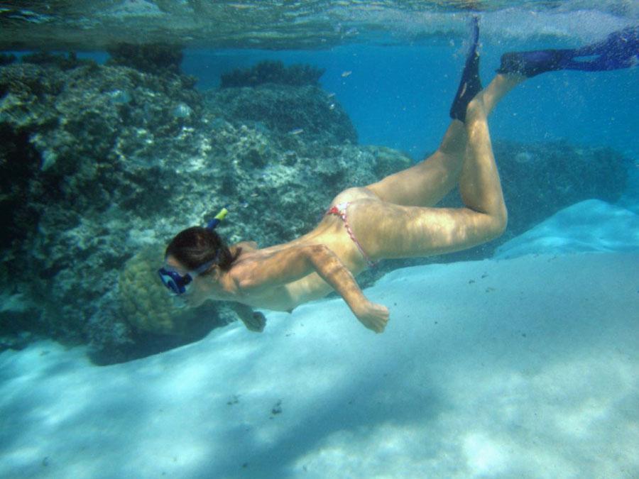 Ebony mermaid practicing underwater bikini