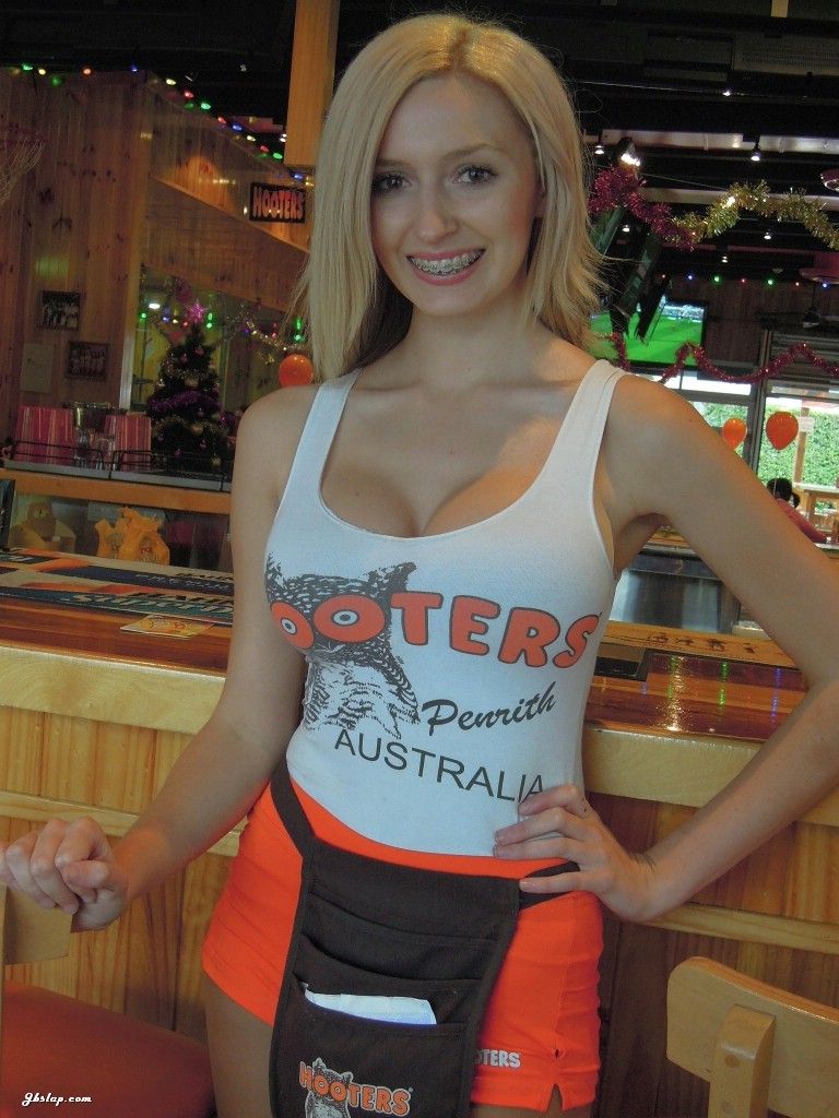 Hooters girl teen teasing camera with